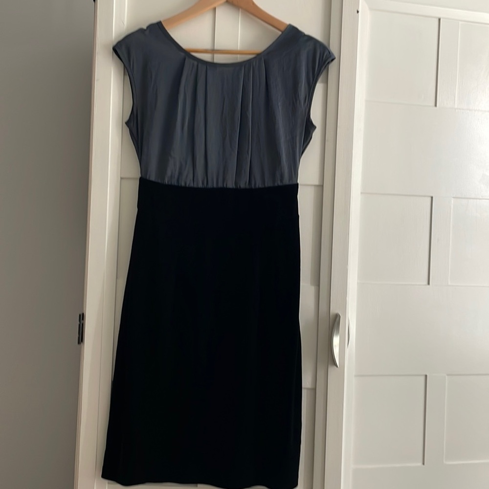 An studio dress- black velvet at navy top. Very flattering on.